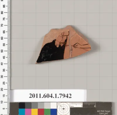 Terracotta fragment of a kylix (drinking cup)