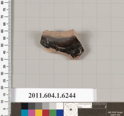 Terracotta fragment of a kylix (drinking cup)