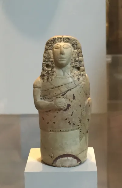 Terracotta aryballos (perfume vase) in the form of a human figure