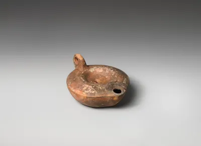 Terracotta oil lamp