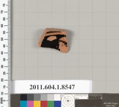 Terracotta fragment of a stemless kylix (drinking cup)