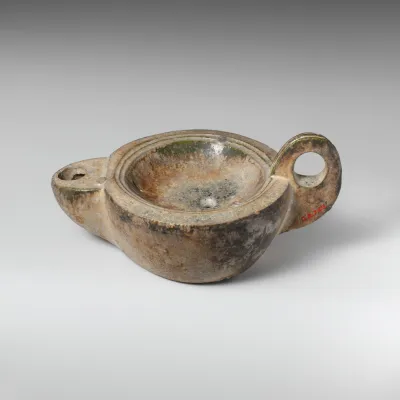Terracotta oil lamp