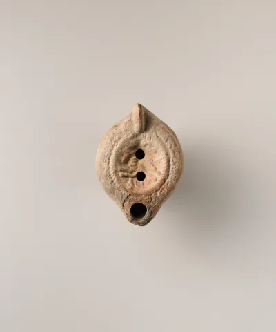 Terracotta oil lamp