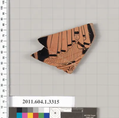 Terracotta fragment of a kylix (drinking cup)