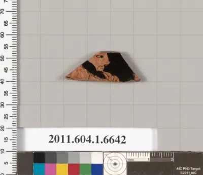 Terracotta fragment of a kylix (drinking cup)