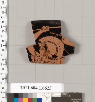 Terracotta rim fragment of a kylix (drinking cup)