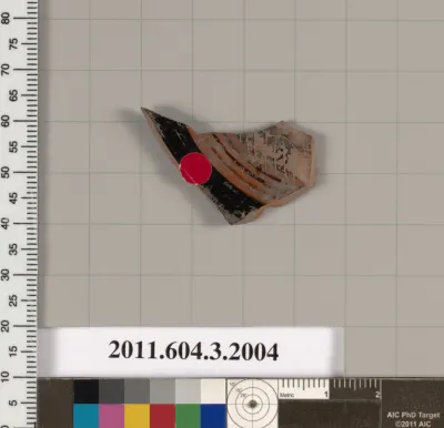 Terracotta fragment of a kylix (drinking cup)