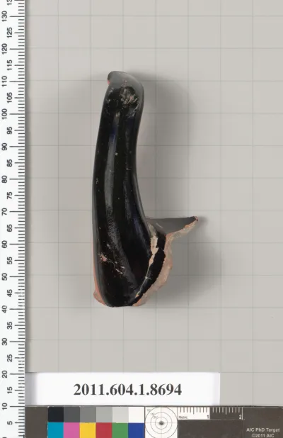 Terracotta fragment of a stemless kylix (drinking cup)