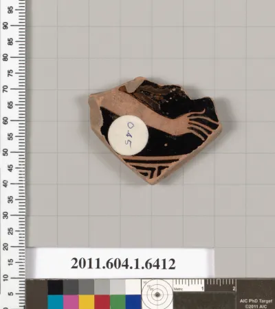 Terracotta fragment of a kylix (drinking cup)