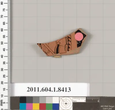 Terracotta fragment of a kylix (drinking cup)