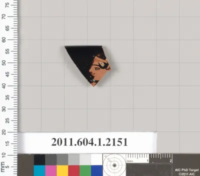 Terracotta rim fragment of a kylix (drinking cup)