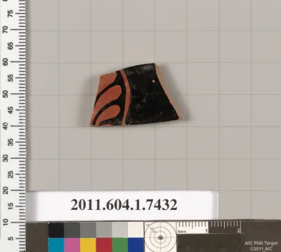 Terracotta fragment of a kylix (drinking cup)