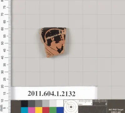 Terracotta rim fragment of a kylix (drinking cup)