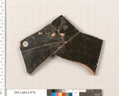 Terracotta fragment of a kylix (drinking cup)