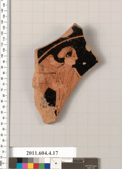Terracotta fragment of a stemless kylix (drinking cup)