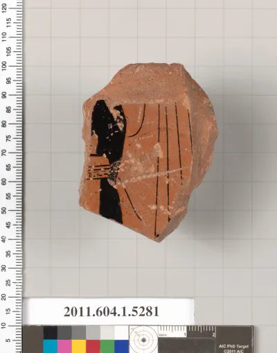 Terracotta fragment of a kylix (drinking cup)