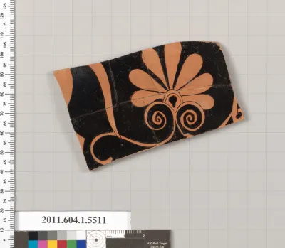 Terracotta fragment of a kylix (drinking cup)