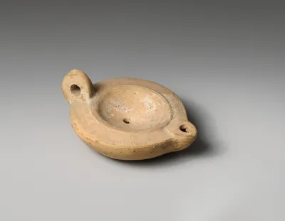 Terracotta oil lamp