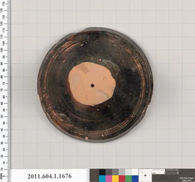 Terracotta fragment of a kylix (drinking cup)