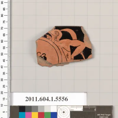 Terracotta rim fragment of a kylix (drinking cup)
