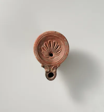Terracotta oil lamp