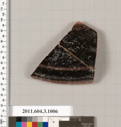 Terracotta fragment of a lekanis lid (covered dish)?