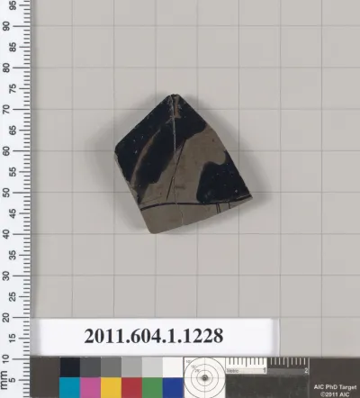 Terracotta fragment of a kylix (drinking cup)