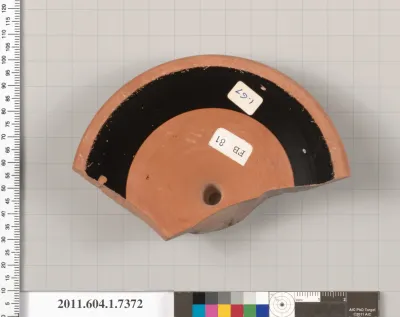 Terracotta fragment of a kylix (drinking cup)