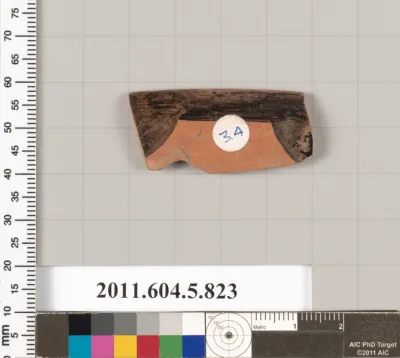 Terracotta rim fragment of a kylix (drinking cup)