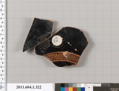 Terracotta fragment of a kylix (drinking cup)