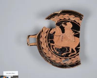 Terracotta fragment of a kylix (drinking cup)