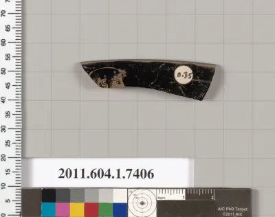 Terracotta rim fragment of a kylix (drinking cup)