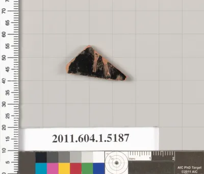 Terracotta fragment of a kylix (drinking cup)