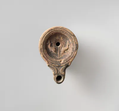 Terracotta oil lamp