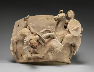 Terracotta relief probably from a funnel vase