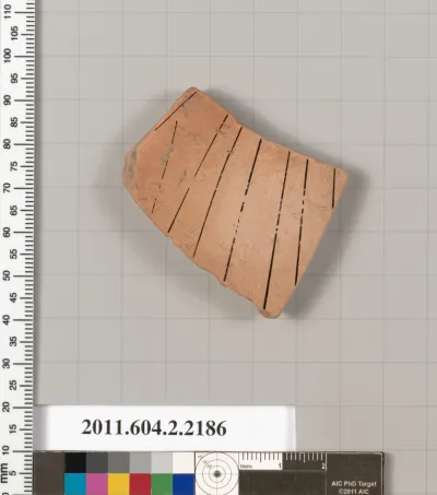 Terracotta fragment of a pot; unglazed on the inside