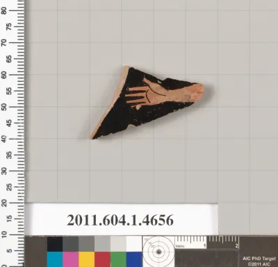 Terracotta fragment of a kylix (drinking cup)