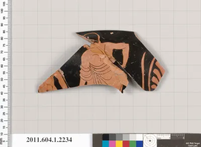Terracotta rim fragment of a kylix (drinking cup)