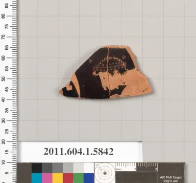 Terracotta rim fragment of a kylix: eye-cup (drinking cup)