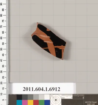 Terracotta fragment of a kylix (drinking cup)