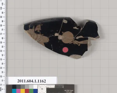 Terracotta rim fragment of a kylix (drinking cup)