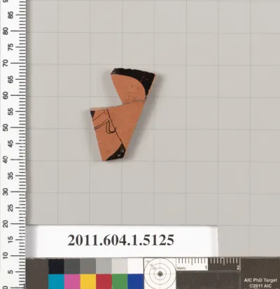 Terracotta fragment of a kylix (drinking cup)