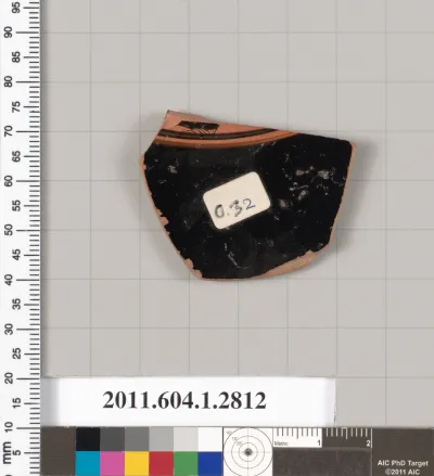 Terracotta fragment of a kylix (drinking cup)