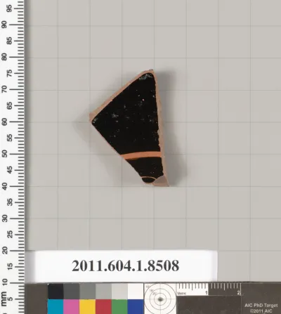 Terracotta fragment of a stemless kylix (drinking cup)