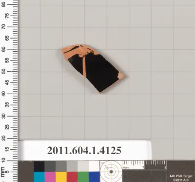 Terracotta fragment of a kylix (drinking cup)