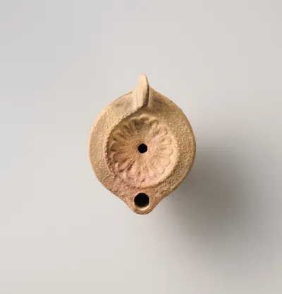 Terracotta oil lamp