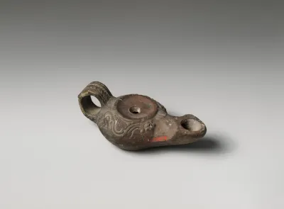 Terracotta oil lamp