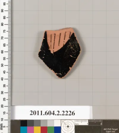 Terracotta fragment of a pot; unglazed on the inside