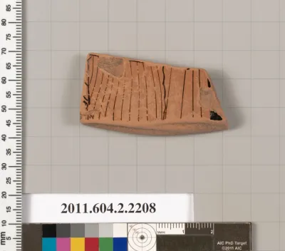 Terracotta fragment of a pot; unglazed on the inside