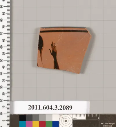 Terracotta rim fragment of a kylix (drinking cup)